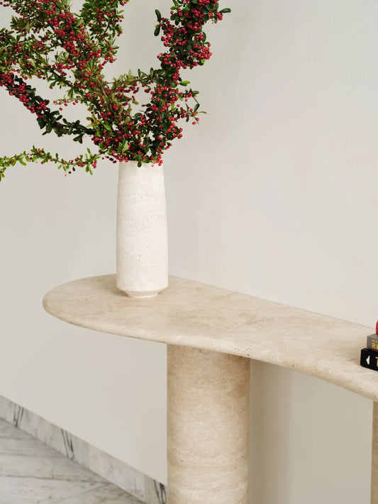 Tubby console in beige travertine, detail