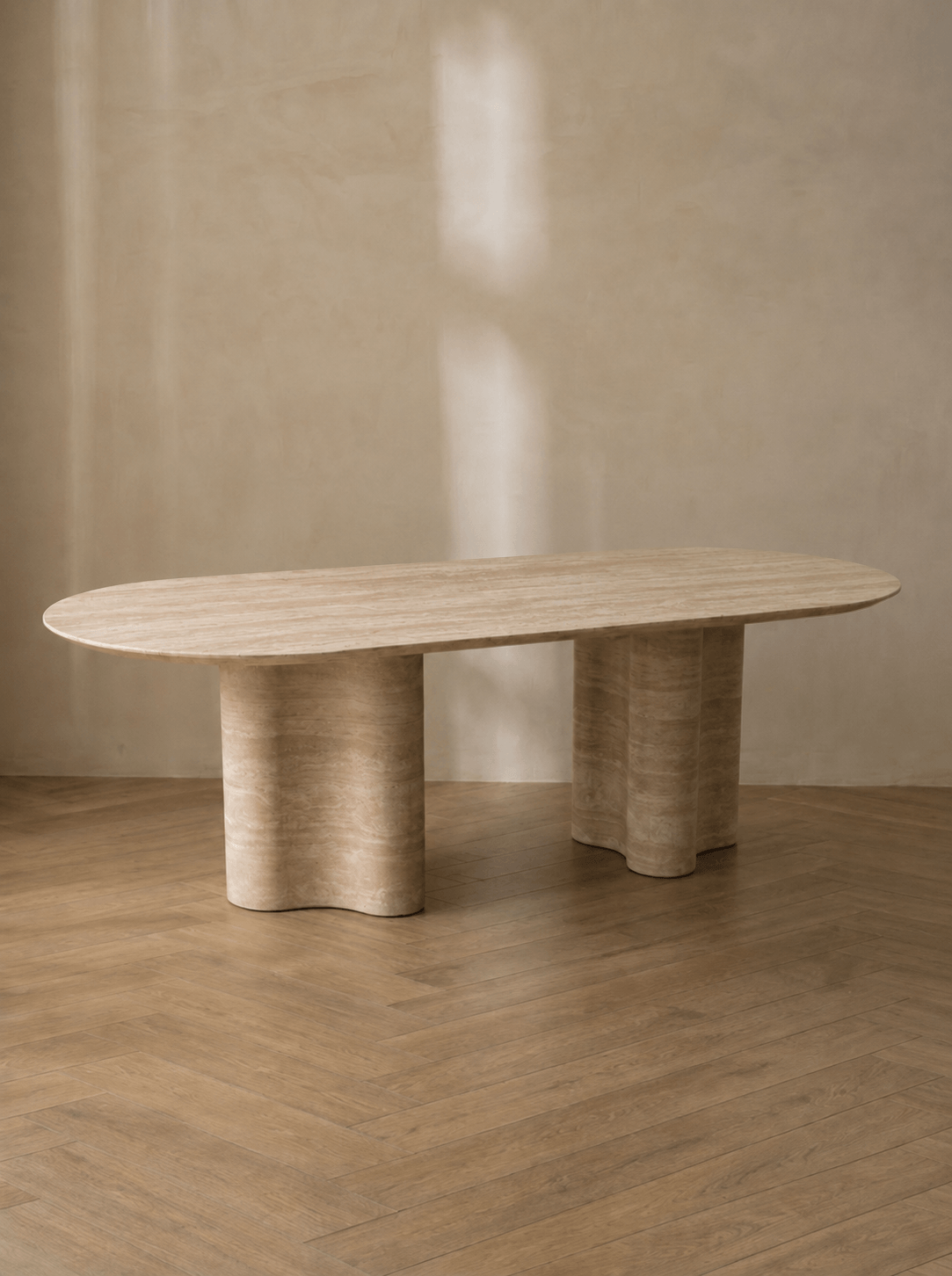 Ripple Dining Table in natural travertine | Sculptural stone dining table | fform
