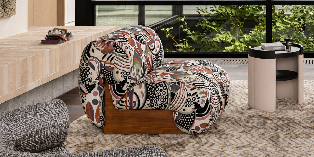 Boba chair in a patterned fabric with a timber base