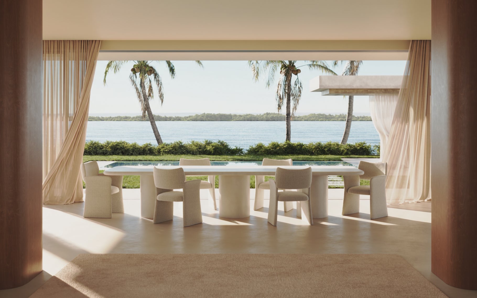 Pillar dining table and Tulip chairs in an open-air pavilion by the water